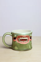 25 - Face Mug