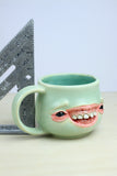 25 - Face Mug